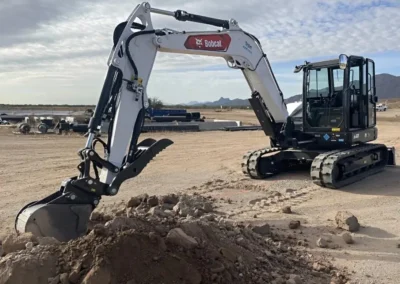 Belco excavator digging on an Arizona jobsite
