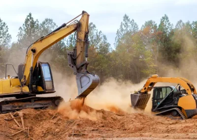 A dozer and excavator moving earth on a site